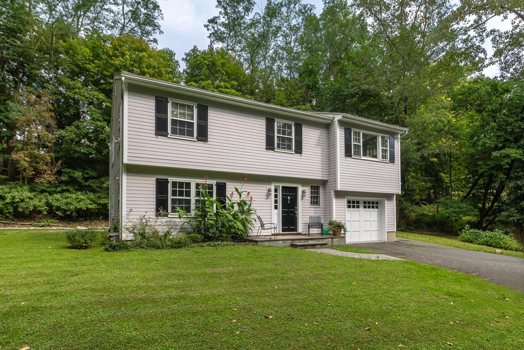3 Hollow Spring Road Norwalk, CT 06854 - Photo 26 of 30 a front view of house with yard and green space