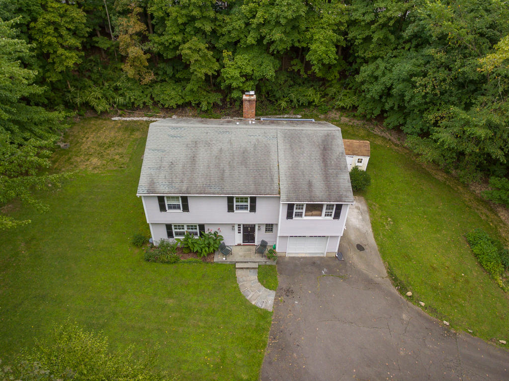 3 Hollow Spring Road Norwalk, CT 06854 - Photo 4 of 30 an aerial view of a house with swimming pool and garden