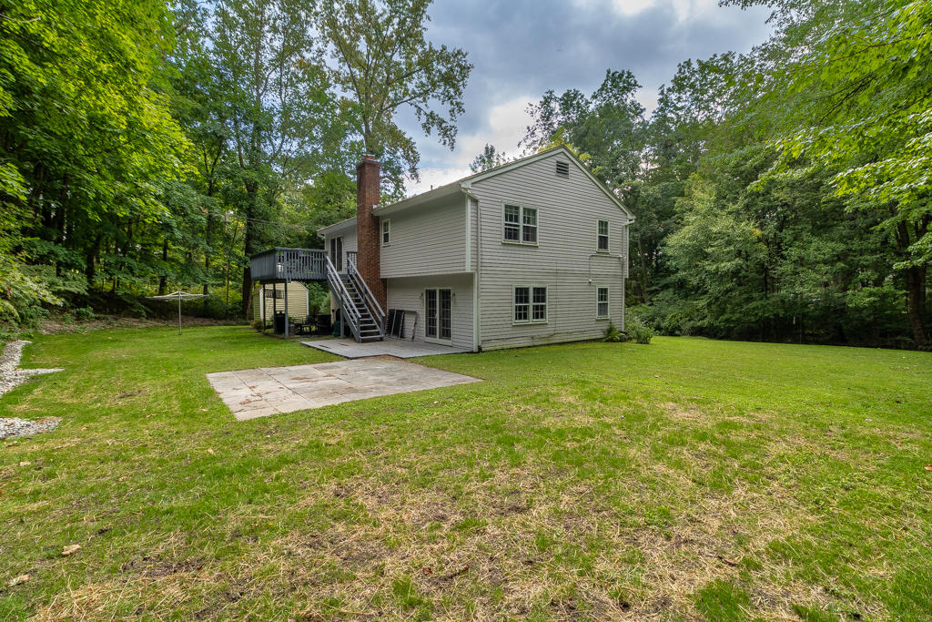 3 Hollow Spring Road Norwalk, CT 06854 - Photo 6 of 30 a view of a house with backyard and garden