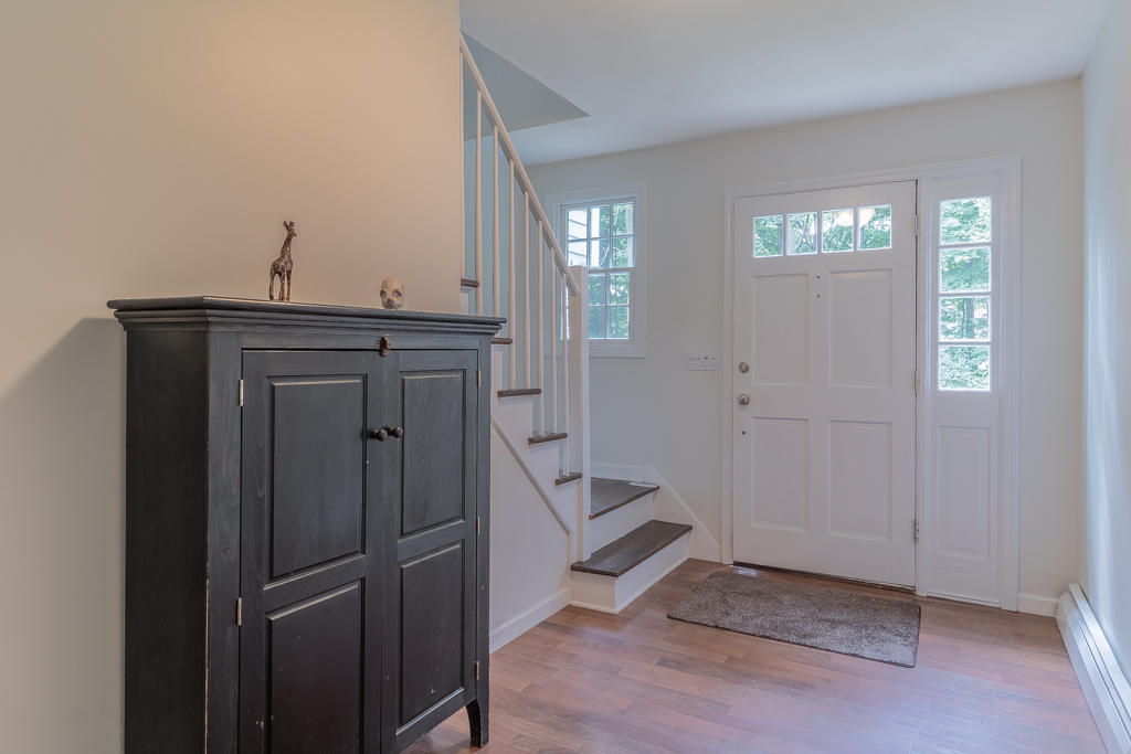 3 Hollow Spring Road Norwalk, CT 06854 - Photo 7 of 30 a view of wooden floor and windows in a room