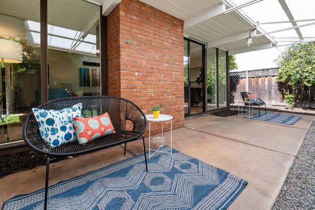 a view of outdoor seating area with furniture