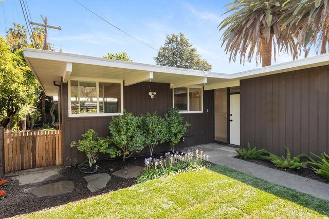 a view of a house with a swimming pool