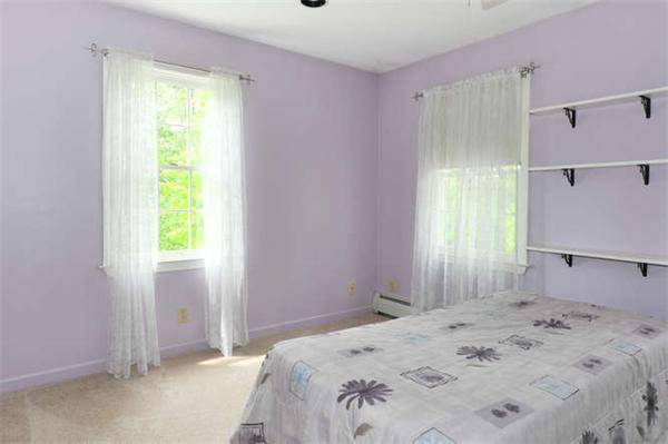 6 Bradish Farm Road Upton, MA 01568 - Photo 19 of 30 a bedroom with a bed and a window