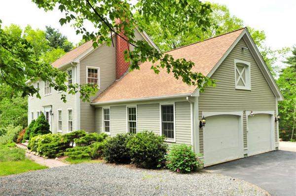 6 Bradish Farm Road Upton, MA 01568 - Photo 3 of 30 a view of a house with a yard and plants