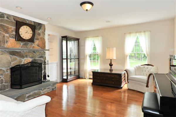 6 Bradish Farm Road Upton, MA 01568 - Photo 6 of 30 a living room with furniture a fireplace and a large window
