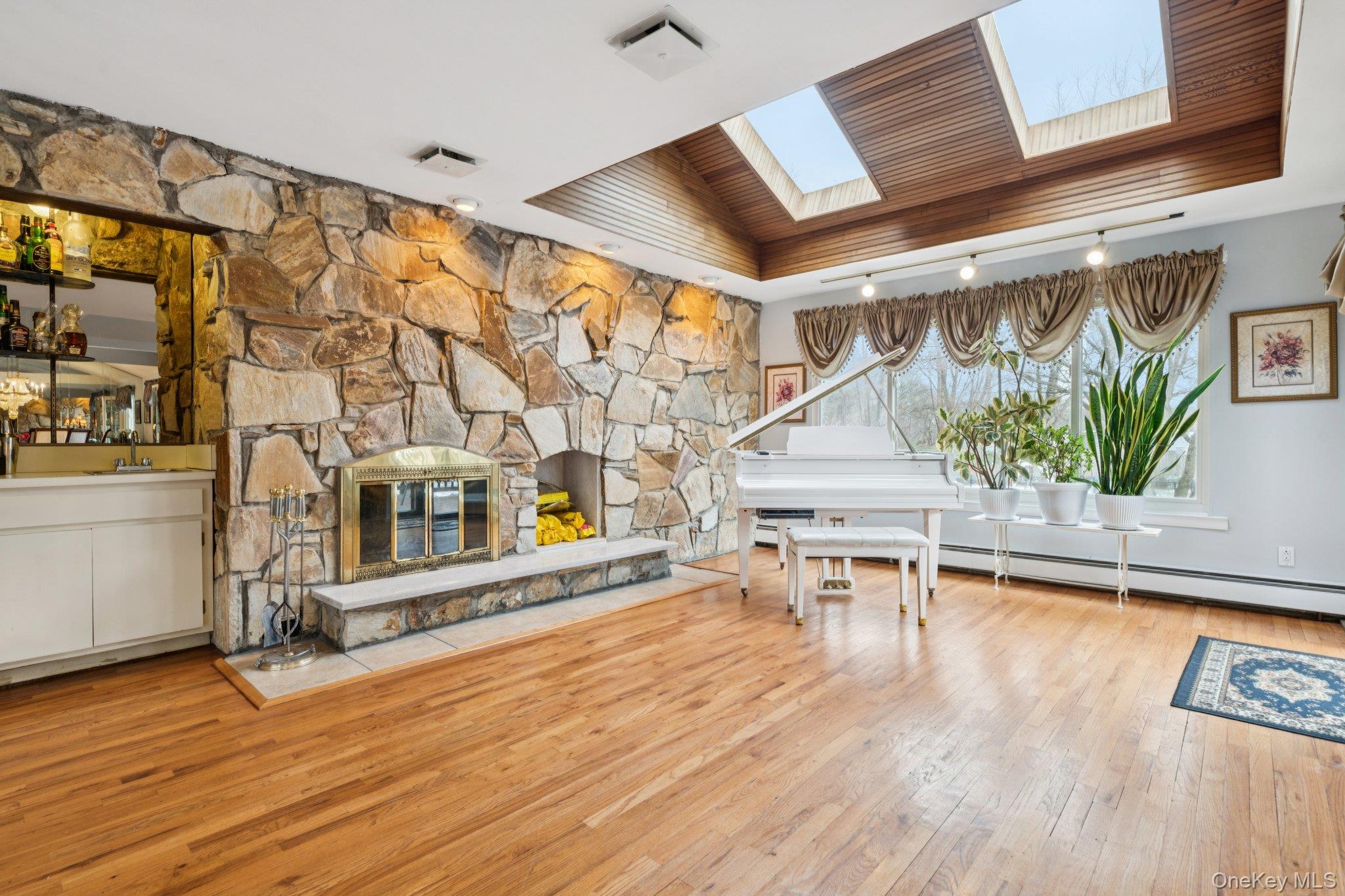 16 Fox Hollow Ridings Road Northport, NY 11768 - Photo 6 of 30 Gorgeous wood-burning full-stone-wall fireplace