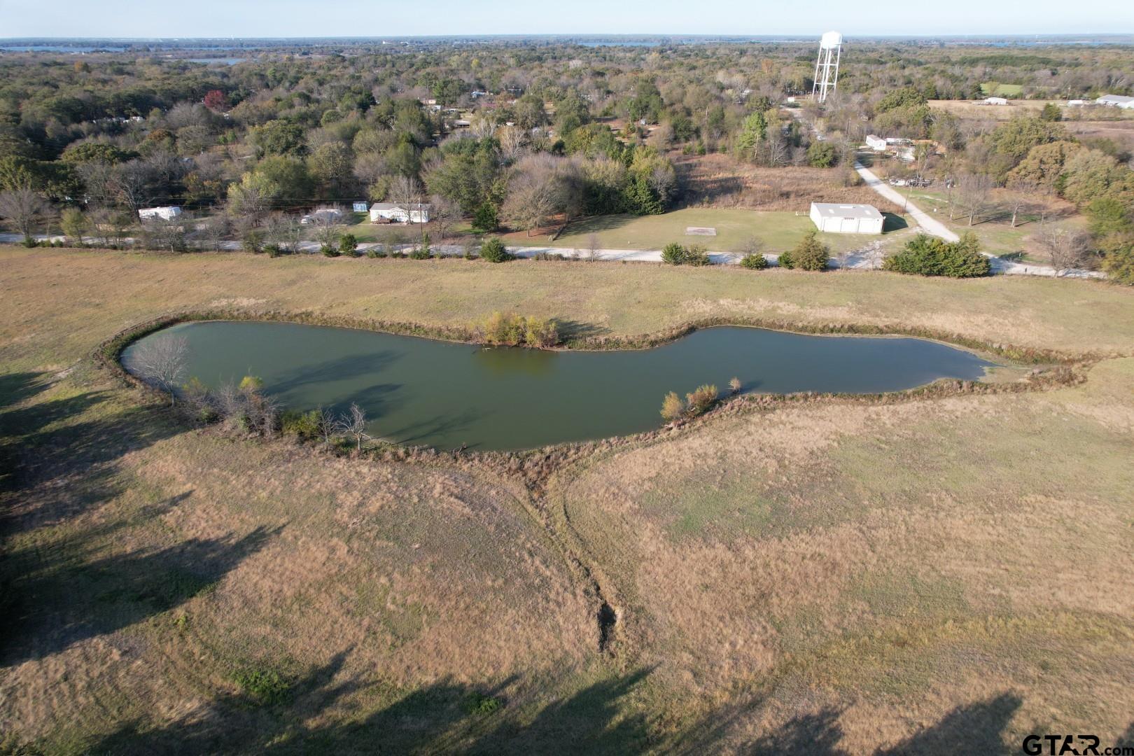 3827 Wills Point Wills Point, TX 75169 - Photo 15 of 23 a view of a lake with a mountain