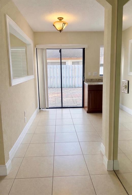 9616 Golf State Park Way Boca Raton, FL 33428 - Photo 12 of 22 a view of an entryway with a livingroom