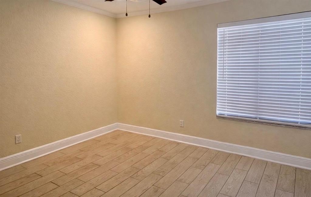 9616 Golf State Park Way Boca Raton, FL 33428 - Photo 9 of 22 an empty room with a window