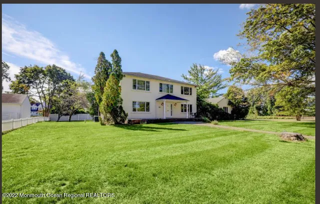a house with garden in front of it