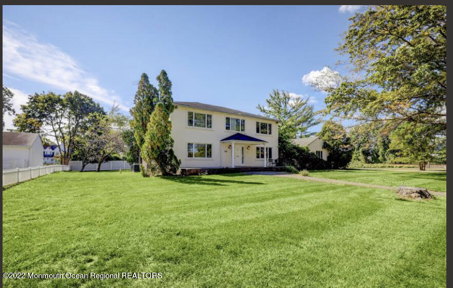 a house with garden in front of it
