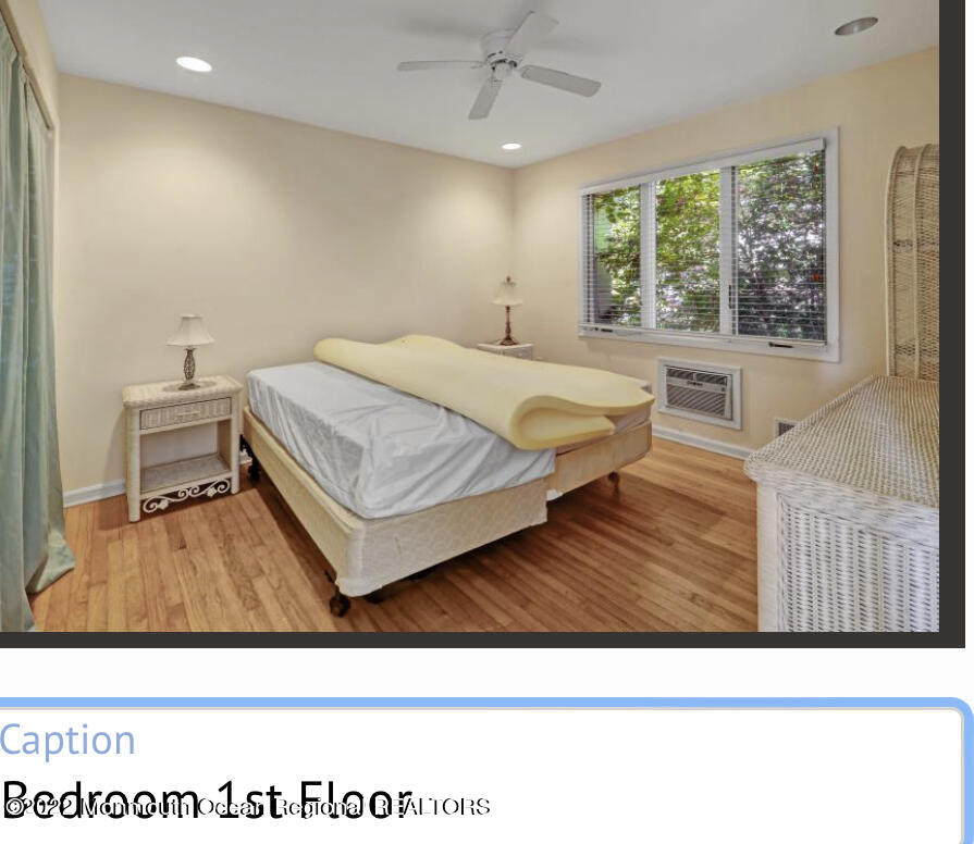 112 Roseld Avenue Deal, NJ 07723 - Photo 16 of 39 a living room with a bed furniture and a large window