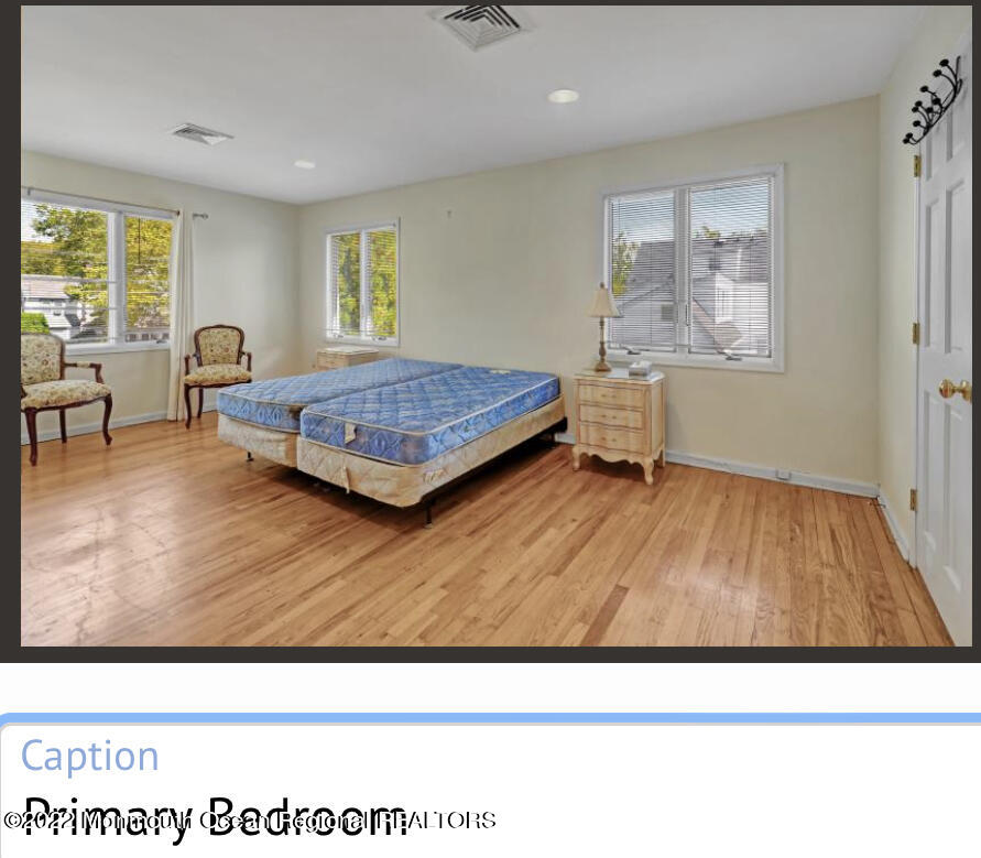 112 Roseld Avenue Deal, NJ 07723 - Photo 20 of 39 a living room with a wooden floor