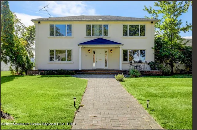 a view of a back yard of the house