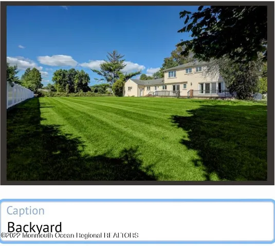 a view of house with garden