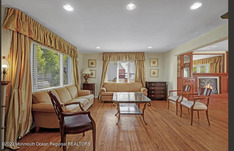 112 Roseld Avenue Deal, NJ 07723 - Photo 6 of 39 a living room with furniture and a large window