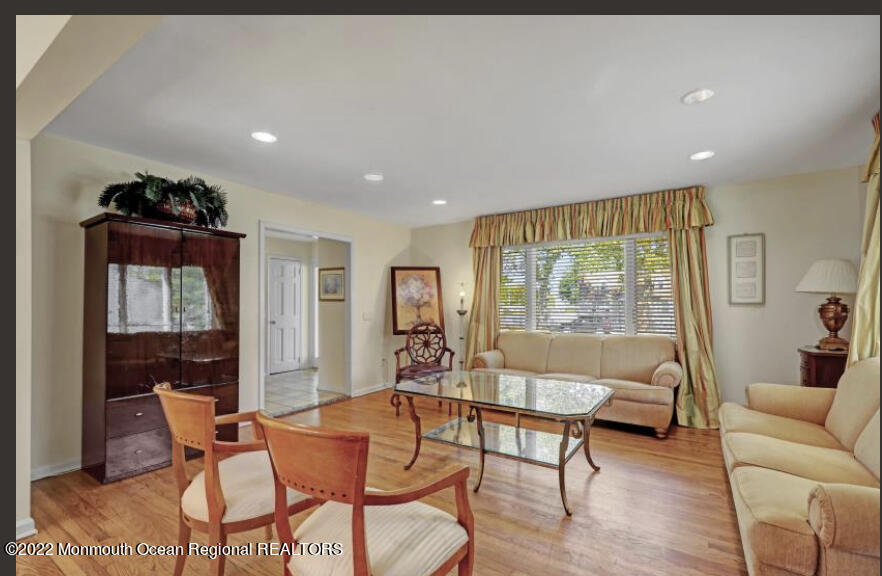 112 Roseld Avenue Deal, NJ 07723 - Photo 7 of 39 a living room with furniture and a large window