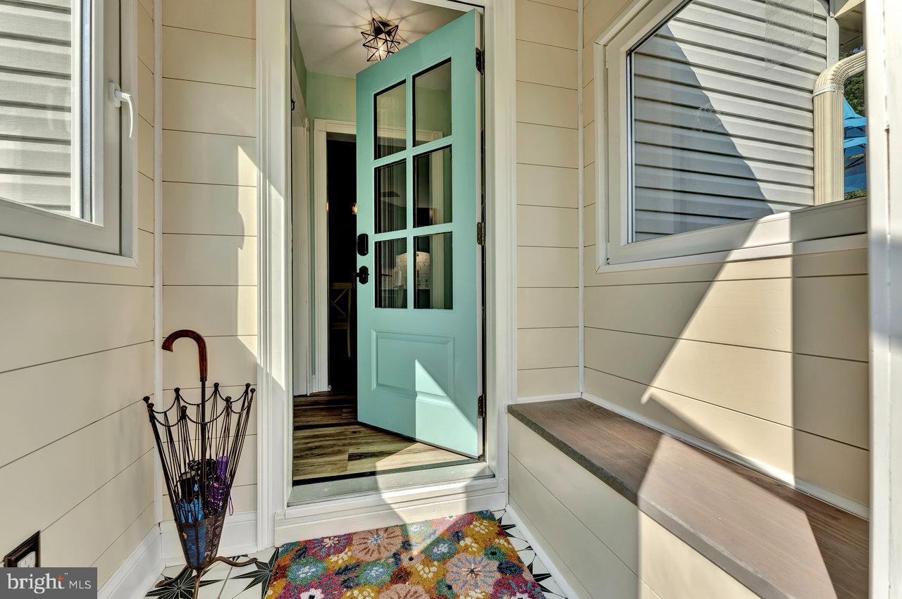 254 Friendship Road Cranbury, NJ 08512 - Photo 20 of 44 a view of a balcony with chairs