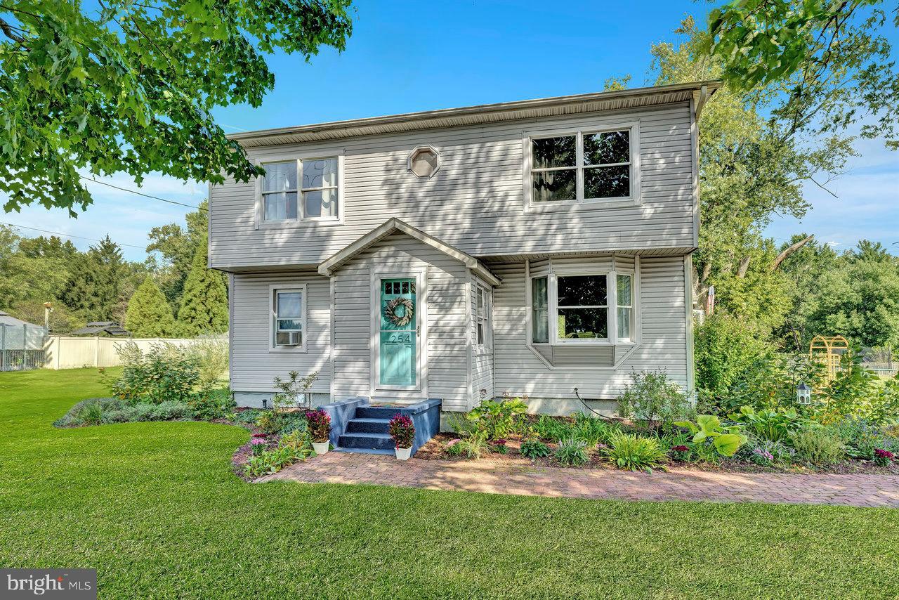 254 Friendship Road Cranbury, NJ 08512 - Photo 2 of 44 front view of a house with a yard