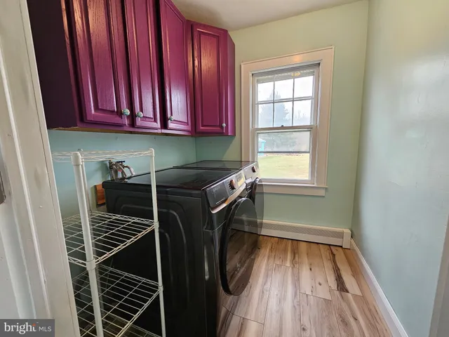 a bathroom with a toilet a shower and a sink