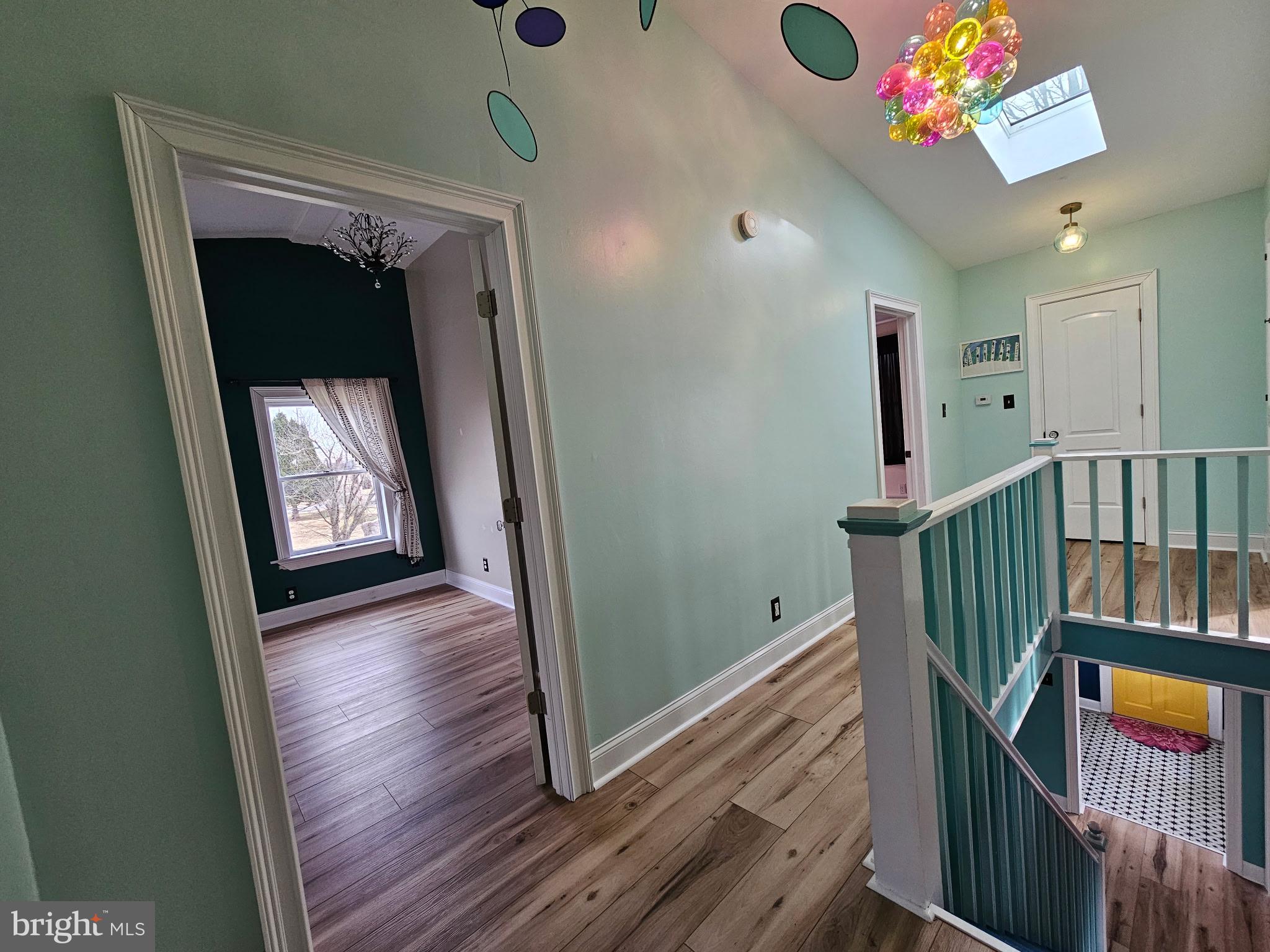 254 Friendship Road Cranbury, NJ 08512 - Photo 34 of 44 a view of an entryway door and wooden floor