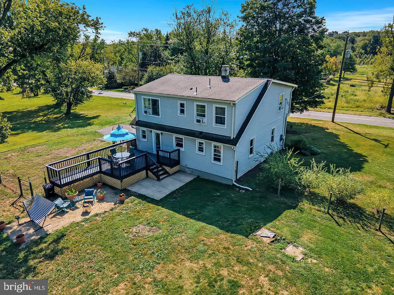 254 Friendship Road Cranbury, NJ 08512 - Photo 36 of 44 a view of a house with garden