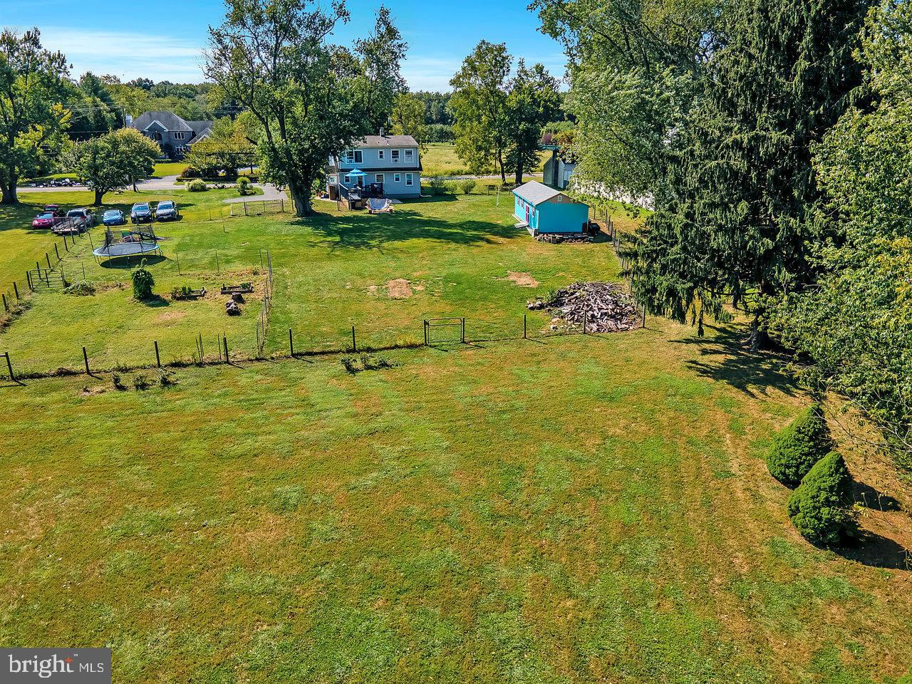 254 Friendship Road Cranbury, NJ 08512 - Photo 38 of 44 a small pool with lawn chairs