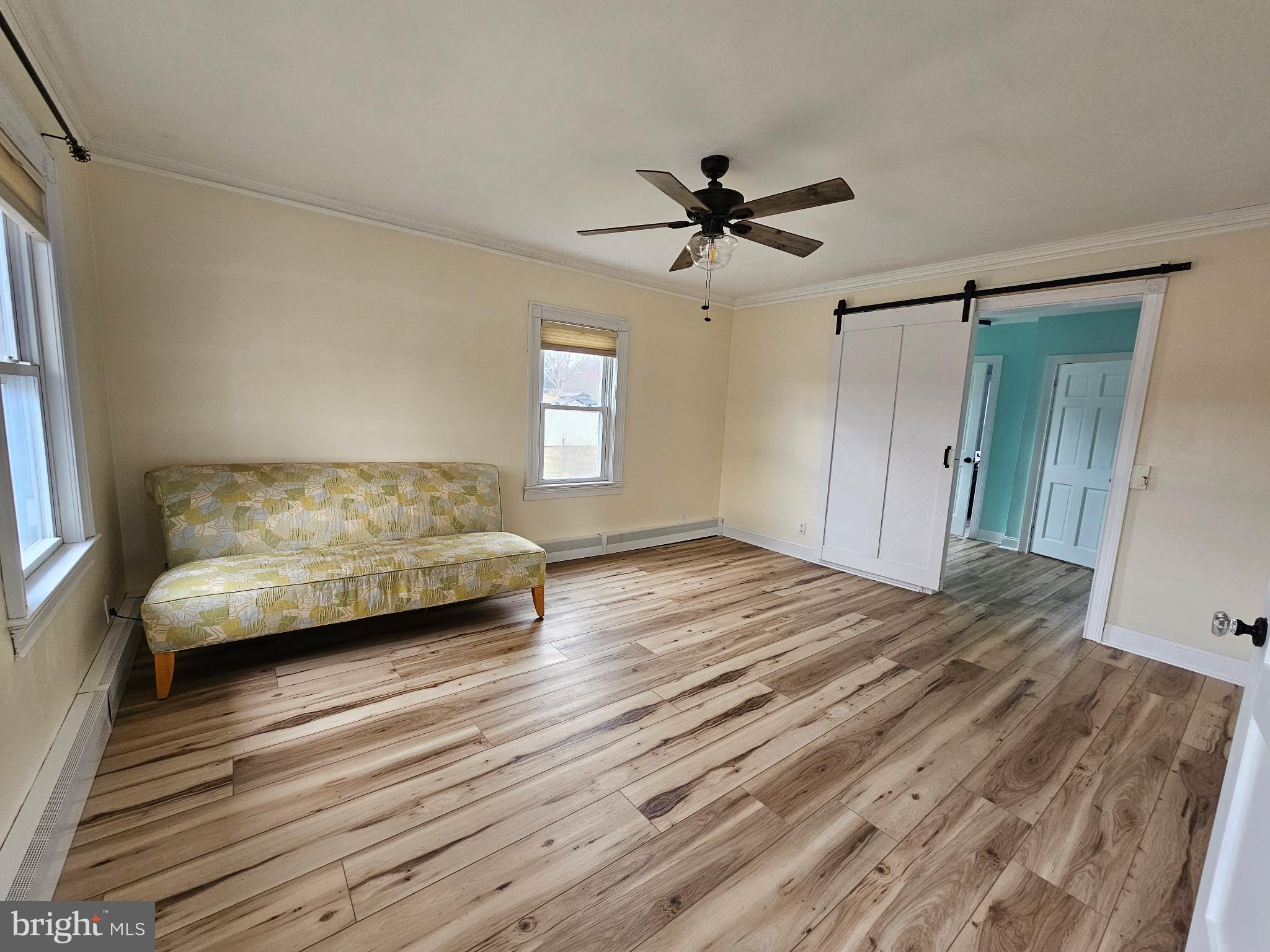 254 Friendship Road Cranbury, NJ 08512 - Photo 4 of 44 a view of a bedroom with furniture and a ceiling fan