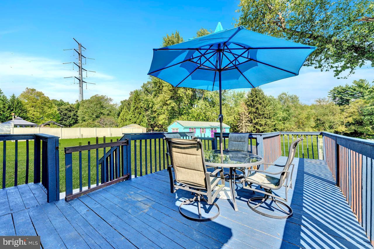 254 Friendship Road Cranbury, NJ 08512 - Photo 42 of 44 a view of a balcony with furniture and wooden deck