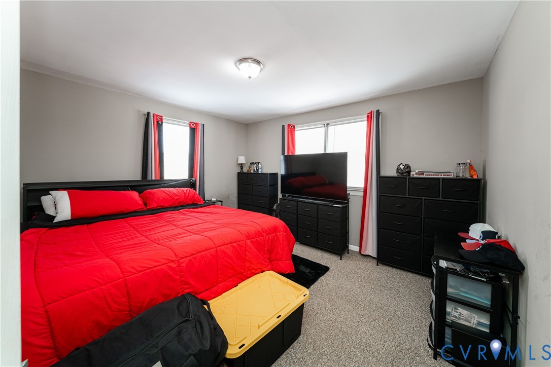 26746 Oxford Road Ruther Glen, VA 22546 - Photo 16 of 25 a bedroom with a bed and a closet