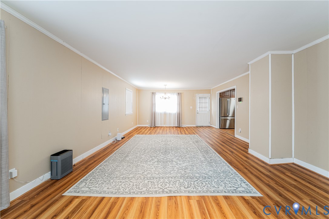 26746 Oxford Road Ruther Glen, VA 22546 - Photo 8 of 25 a view of empty room with wooden floor