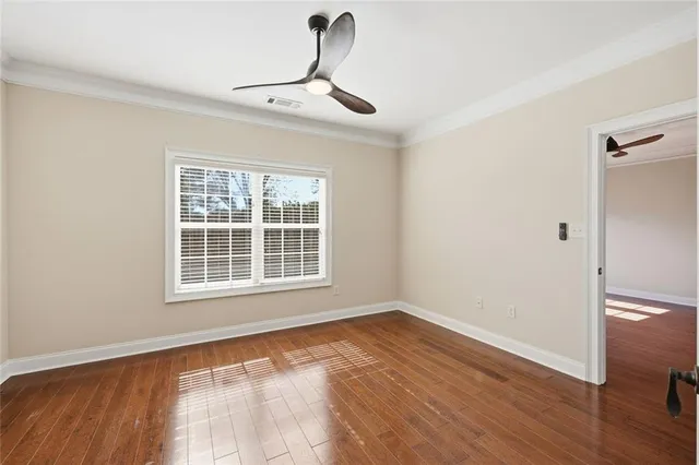 a view of a livingroom with wooden floor