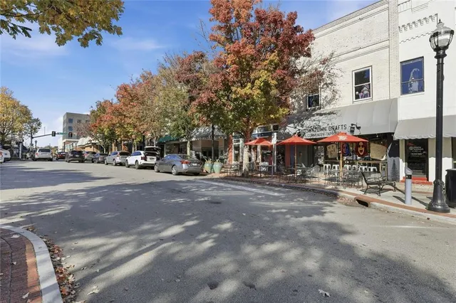 a kitchen with stainless steel appliances granite countertop a lot of counter top space