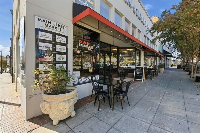 a view of a chairs and table in the patio