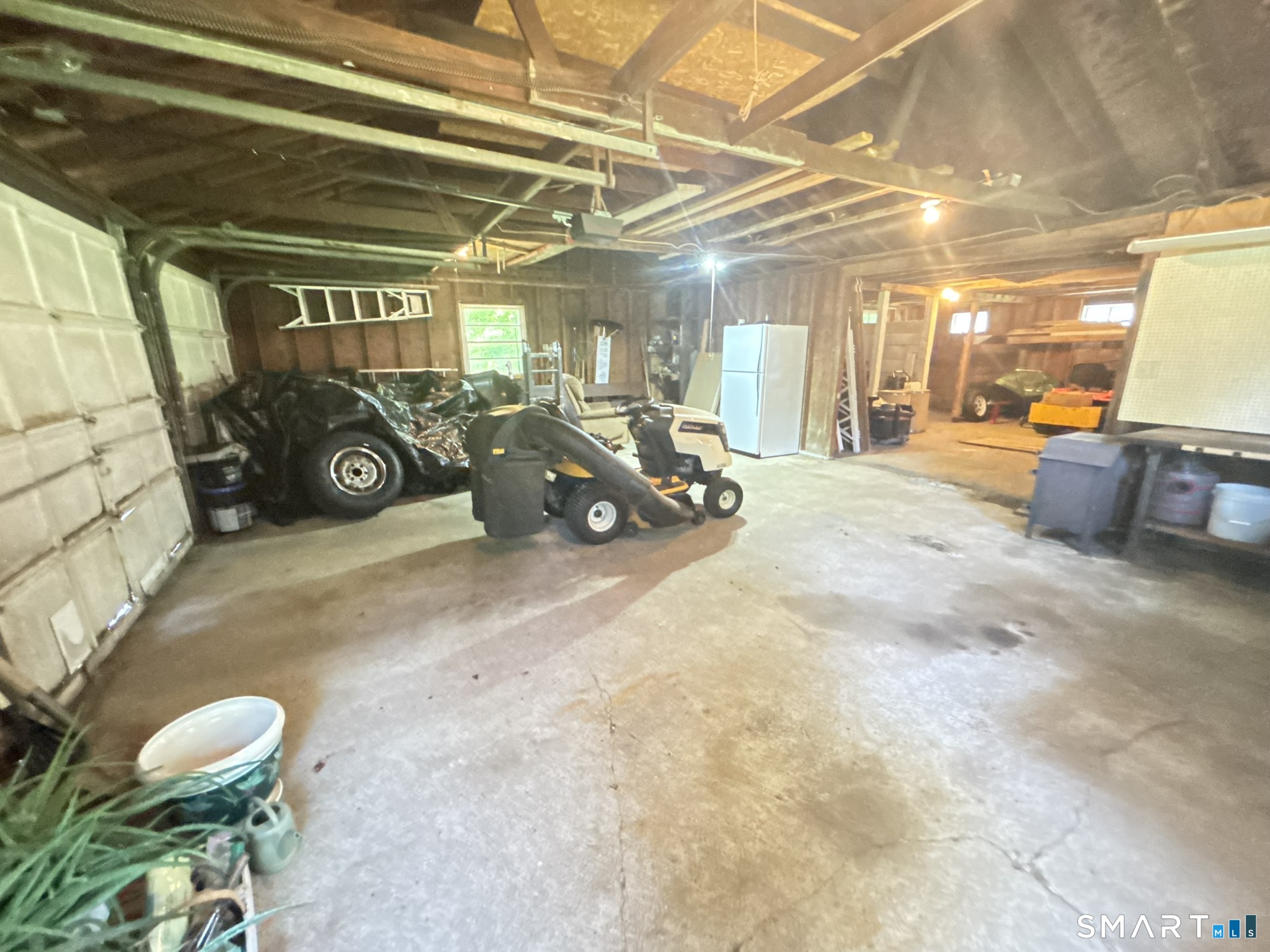 44 Summit Road Prospect, CT 06712 - Photo 31 of 40 a view of a garage with stuff