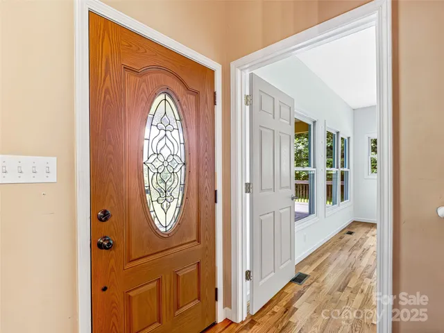 a living room with furniture fireplace and a flat screen tv