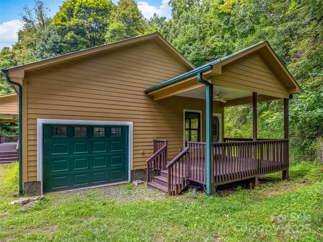 a view of a balcony with wooden floor