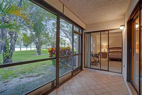 a view of a porch with a backyard