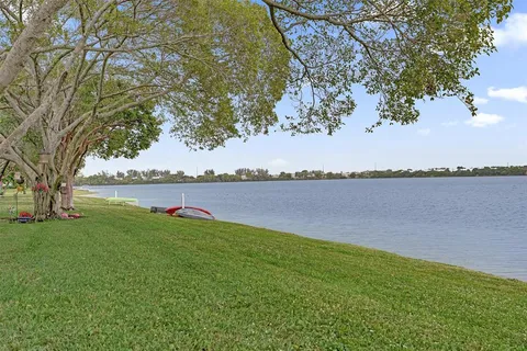a view of a lake from a yard
