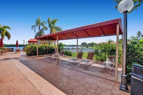 a view of a backyard with a sitting area