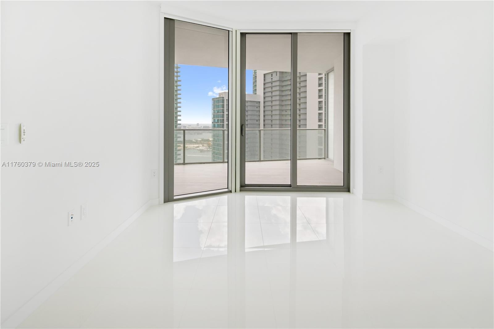 851 Northeast 1st Avenue, Unit 4203 Miami, FL 33132 - Photo 17 of 34 a view of a glass door with a glass door