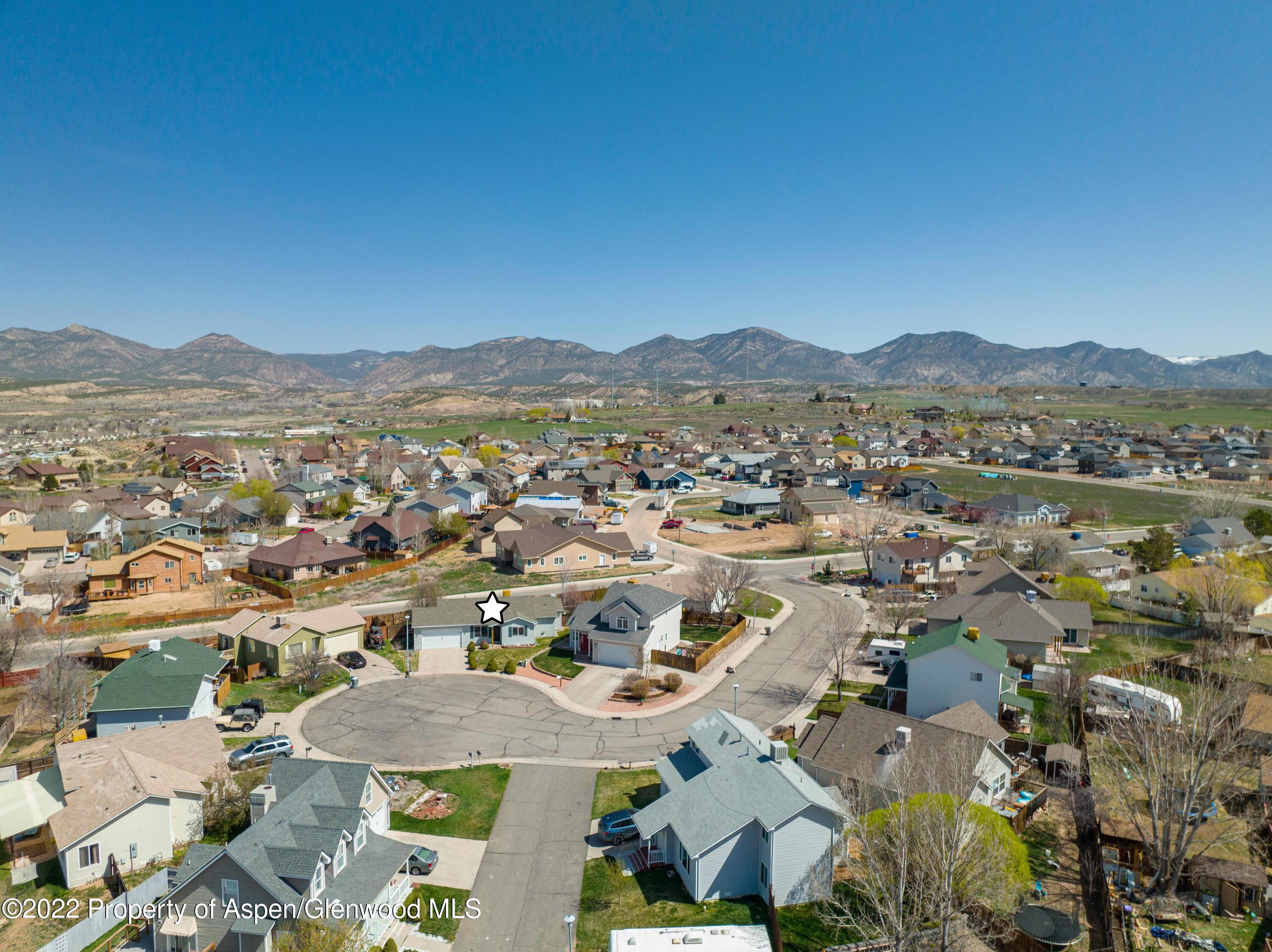 1575 Balsam Court Rifle, CO 81650 - Photo 13 of 14 a view of a city with mountains in the background