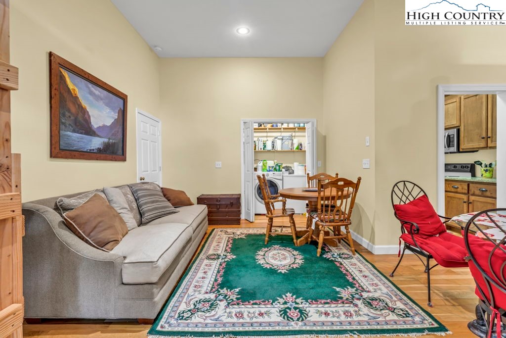 404 Running Deer Trail Boone, NC 28607 - Photo 31 of 38 a living room with furniture and a rug
