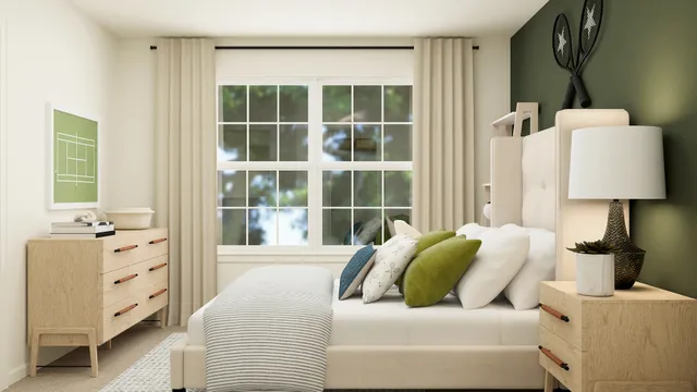 a bedroom with bed and a window