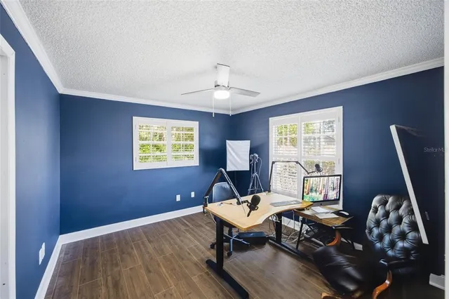 a workspace with furniture and a window