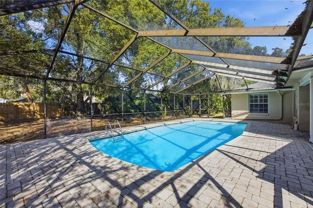a view of a backyard with a patio