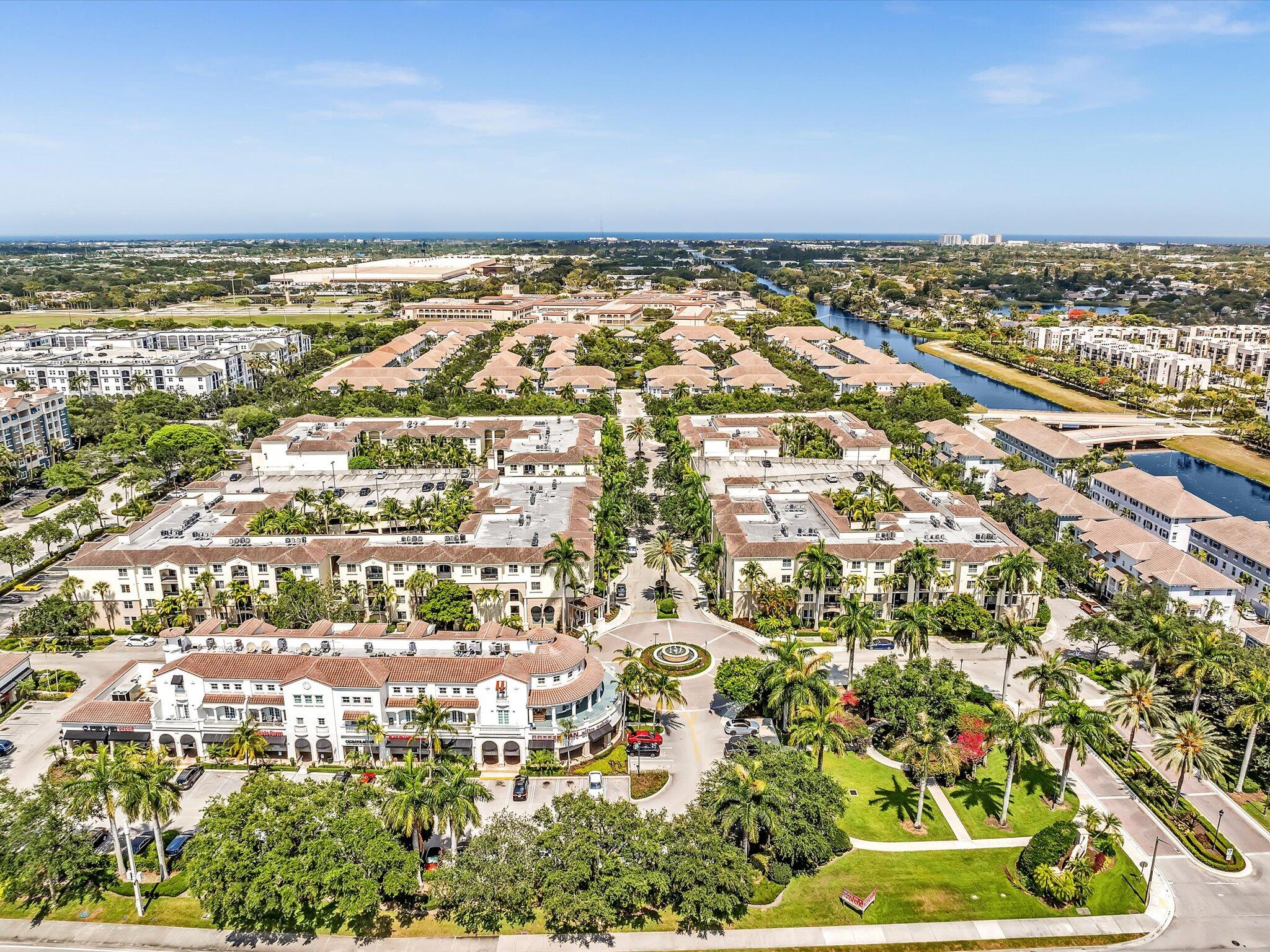 4303 Renaissance Way, Unit 303 Boynton Beach, FL 33426 - Photo 72 of 74 an aerial view of residential building and ocean