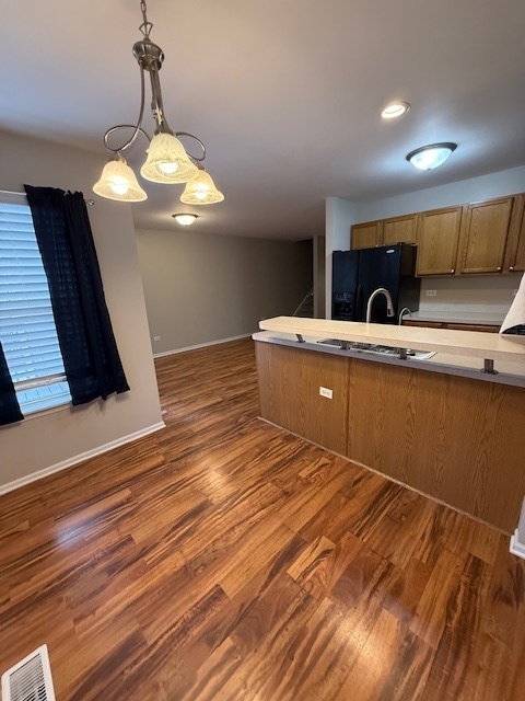 34404 North Barberry Road Round Lake, IL 60073 - Photo 3 of 14 a view of kitchen and wooden floor