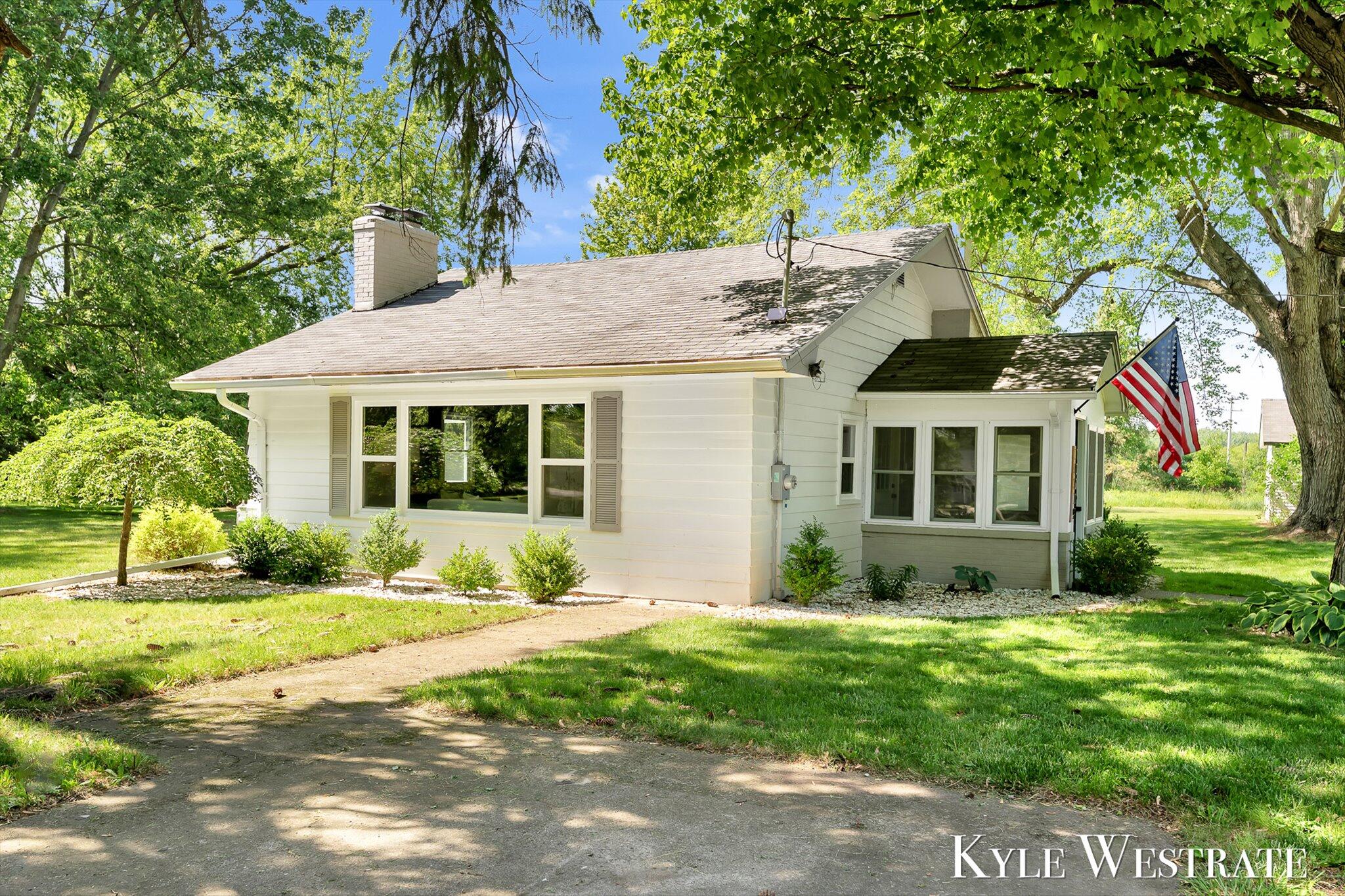 10019 10 Mile Road Northeast Rockford, MI 49341 - Photo 3 of 32 02-ELY07170