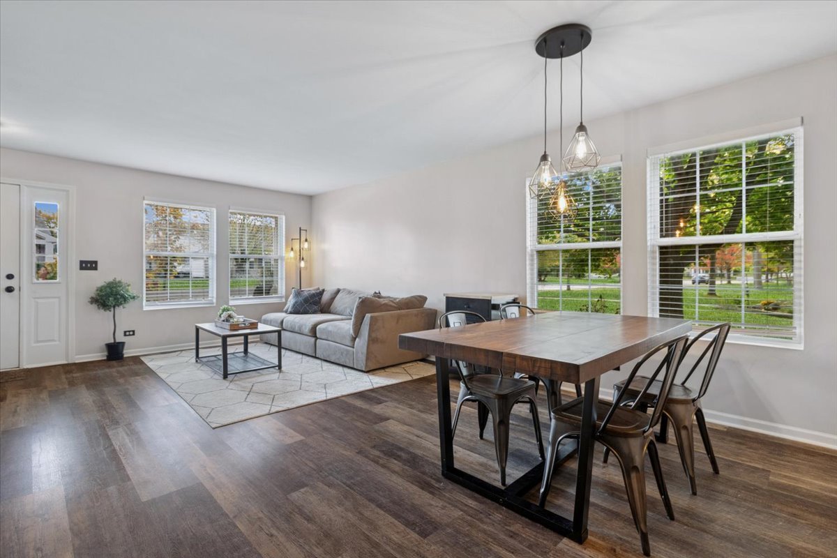 60 Wingate Drive, Unit 60 Oswego, IL 60543 - Photo 3 of 23 a view of a dining room with furniture window and outside view